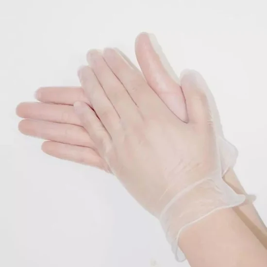 Les gants jetables en PVC sans poudre nettoient les gants en vinyle sans poudre transparents